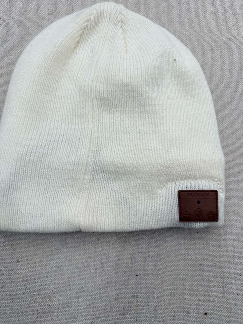 Cream Knit Bluetooth Beanie with Brown Leather Control Patch